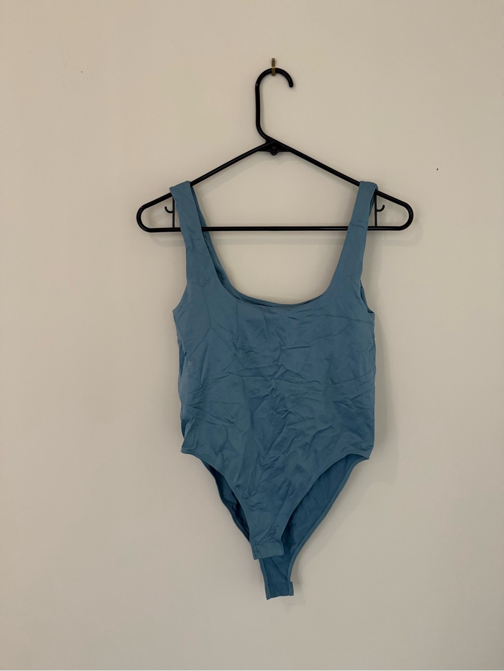 a new day blue bodysuit